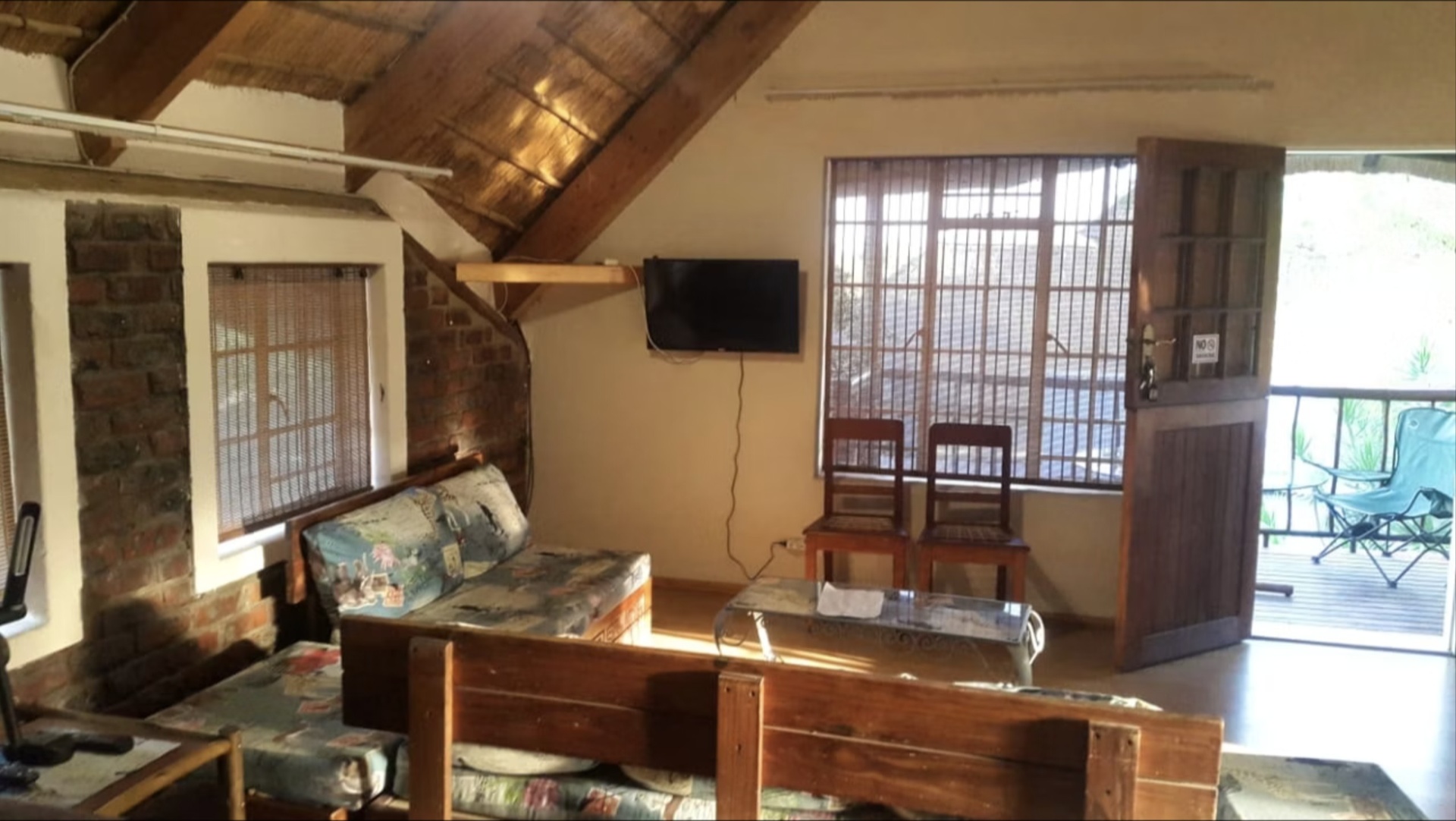 Loft lounge with TV in Unit 2 at Do-Drop-In