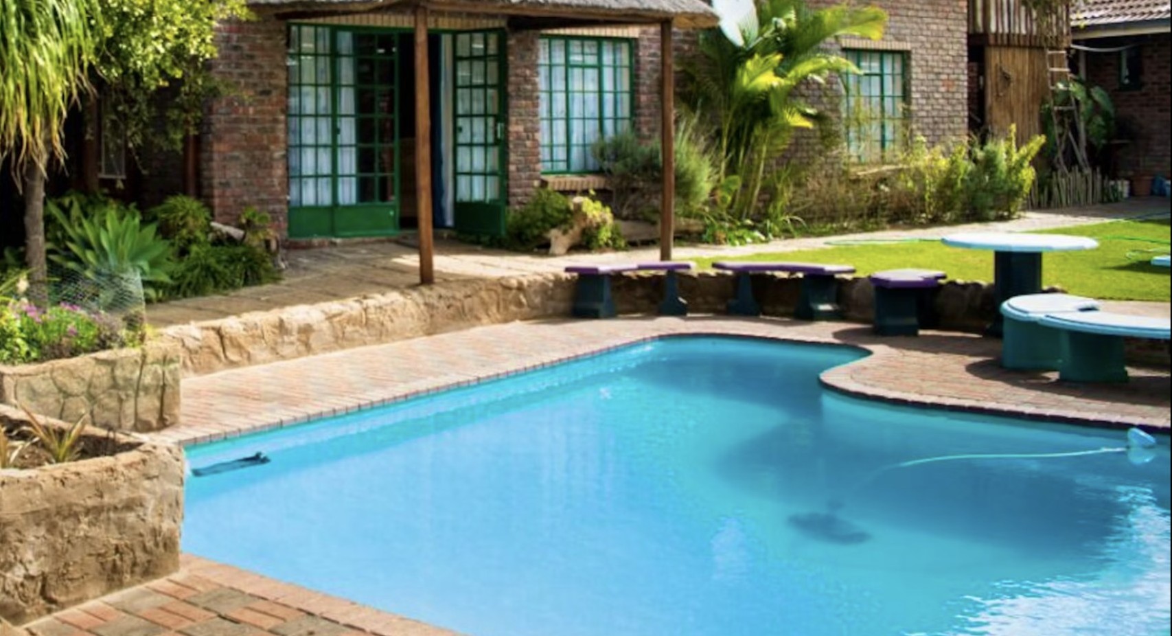 Swimming pool and braai area at Do-Drop-In, Hoedspruit